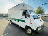 an image of a delivery truck parked in a parking lot