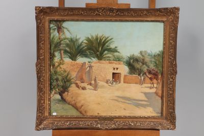 painting on easel of a village scene with a donkey and a house