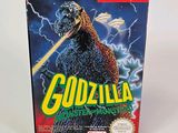 the box for godzilla master of the monsters is sitting on a white surface