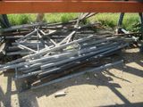 a pile of metal rods sitting on the ground