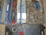 a lot of tools that are laying out on the floor