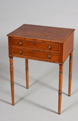 two small wooden tables with drawers on each side of them