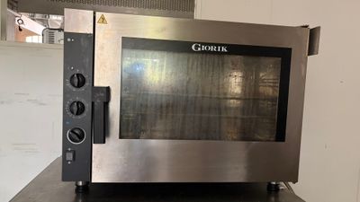 an image of a stainless steel oven sitting on a counter