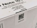 a white box with a qr code on it