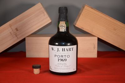 a bottle of wine that is sitting on a table