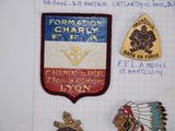 several badges on a piece of paper on a piece of paper