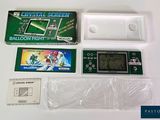 une console Nintendo et une manette dans la boîte