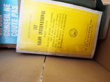 a box full of books that are sitting on the floor
