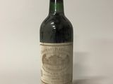 a bottle of wine that is sitting on a table