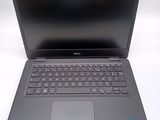 the dell laptop is open and ready to be used