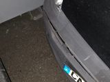 an image of a car that is parked in a garage