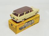 yellow toy car sitting on top of a yellow box on a white surface