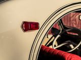a close up of a car ' s interior with a red seat