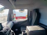 a view of the inside of a van from the driver ' s seat