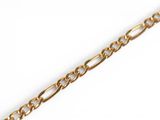 a close up of a gold chain on a white background