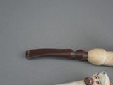 two different types of pipe smokings on a table
