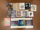 a lot of books that are on the table