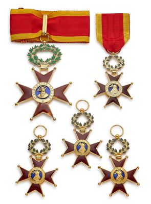 quatre médailles et un ruban orné d'une étoile
