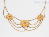 gold plated brass necklace with circular discs and chains