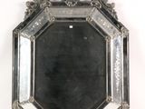 a mirror that is sitting on the wall
