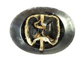 a metal helmet with a brown ribbon on it