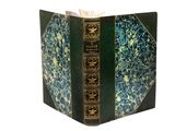 une image représentant un livre à la couverture bleue et aux bords dorés