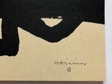 a painting of a black cat on a white surface