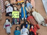 a lot of dolls that are on a table