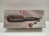 packaging of remington straight brush in a box on a table