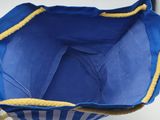 a blue and yellow bag hanging from a hook