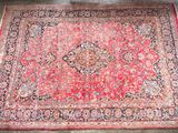 an oriental rug on the floor in a room