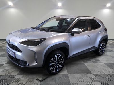 the new toyota c - hr suv is parked on a checkered floor