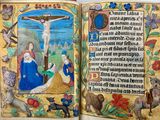 un livre ouvert sur lequel figure une image de Jésus sur la croix