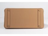 an image of a tan leather wallet on a white background