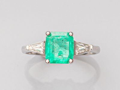 an emerald and diamond ring