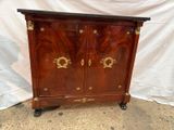 a small cabinet that has a star design on it