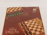 the travel chess set is in its box on the table
