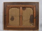 an old wooden window frame with a picture of a cat on it