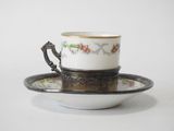 an image of a coffee cup and saucer on a saucer
