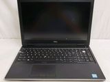 the dell laptop is open and ready to be used