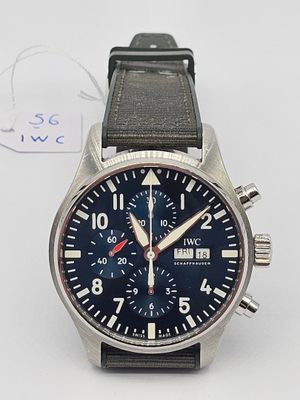 an image of a wrist watch with a blue dial
