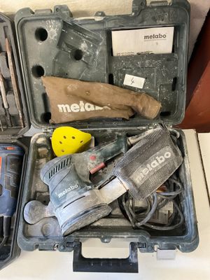 a tool box with tools in it on a table