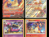 four different pokemon cards are shown in a row on a black background