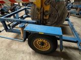 an image of a forklift being used to move a piece of wood