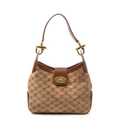 un sac à main marron avec une poignée marron et une bandoulière marron