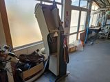a machine that is sitting inside of a building