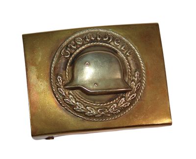 brass plated belt buckle with a helmet on it