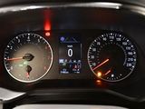 a close up of a car dashboard with various gauges