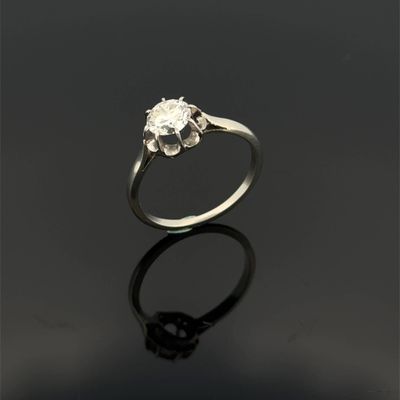 an engagement ring with a single stone in the center