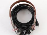 an image of a close up of a bunch of cables on a white surface
